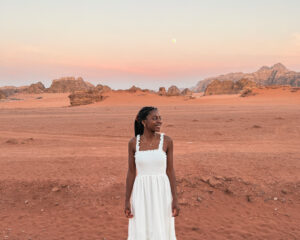 Woman in white during the sunset in Wadi Rum