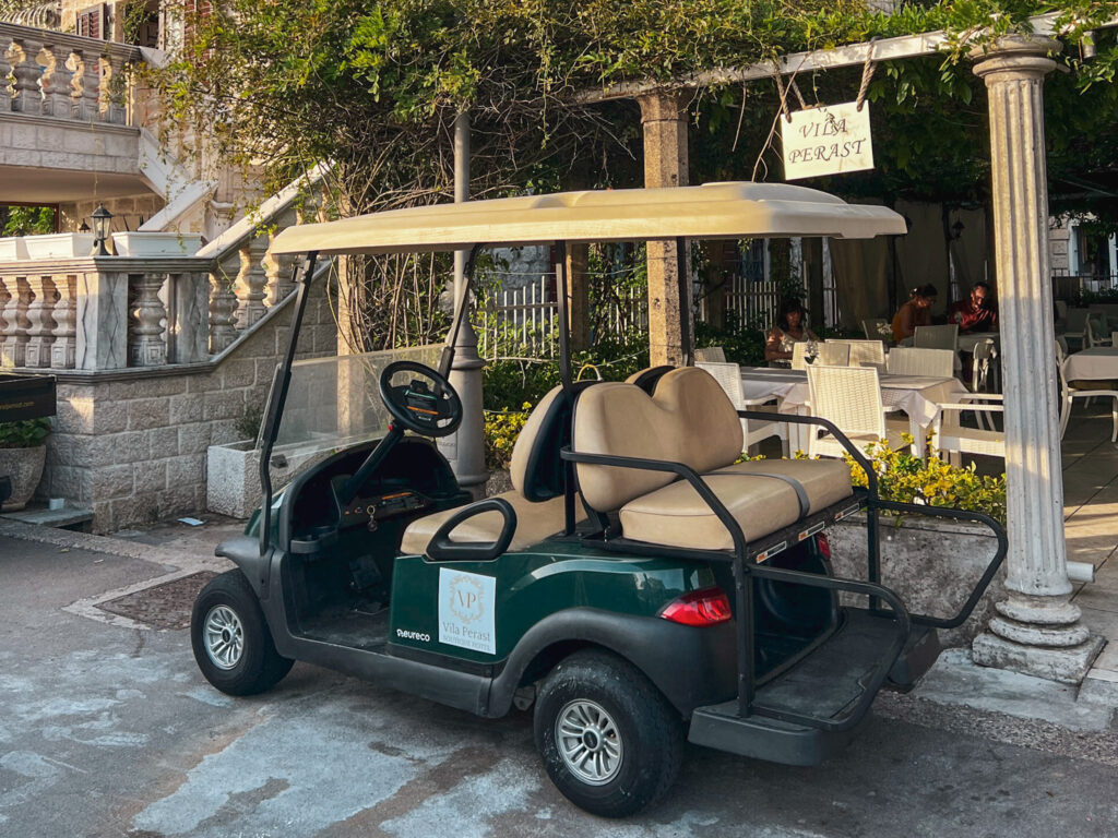 Hotel club car in front of the hotel