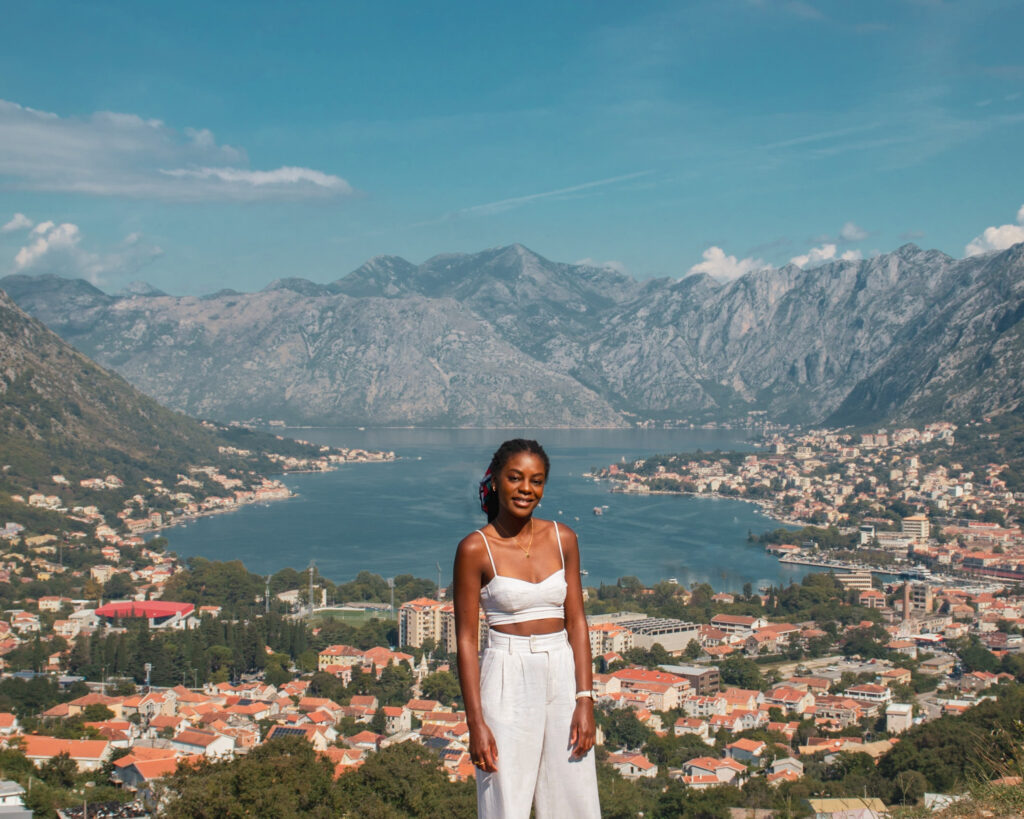 Woman on a hill overlooking Bay of Kotor