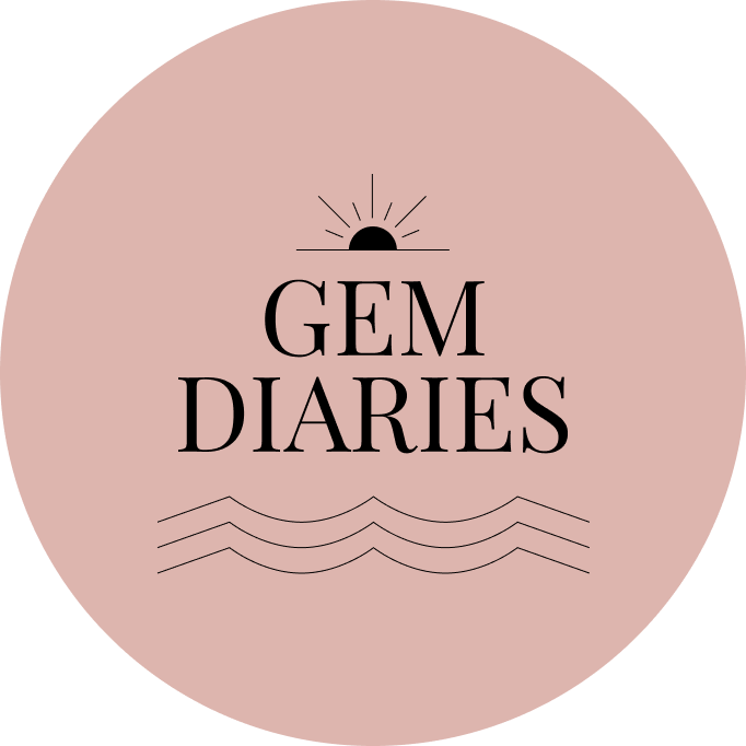Gem Diaries logo pink circle background and black text with waves and sun illustration.